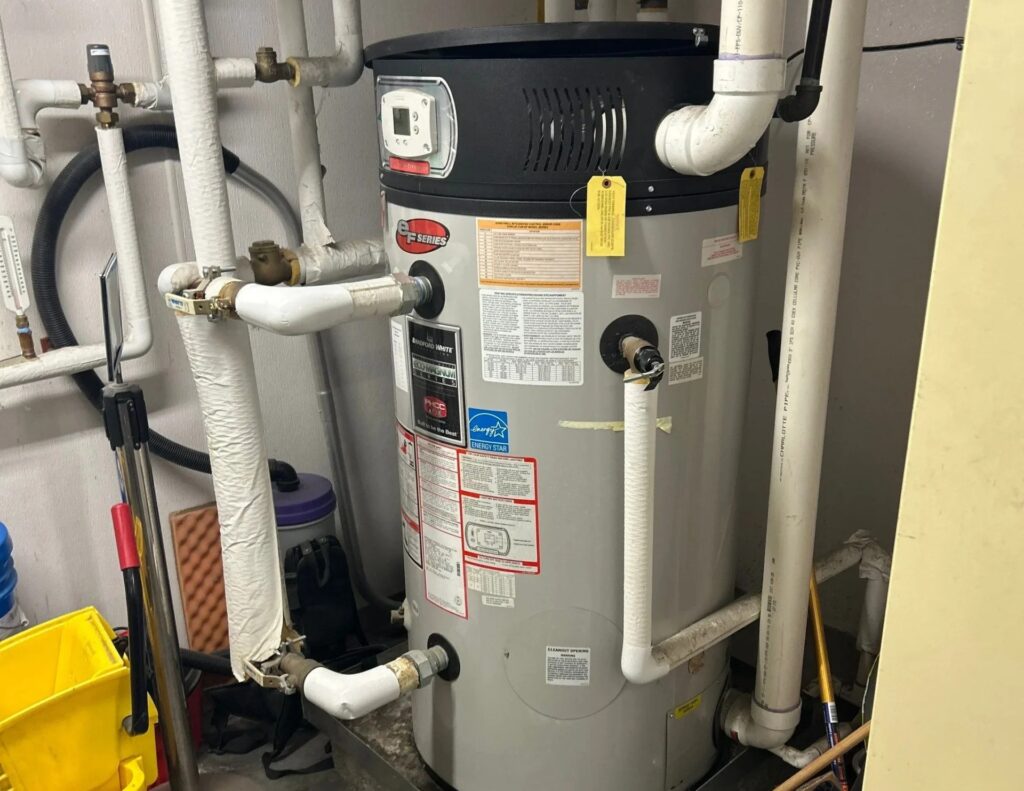 Large commercial water heater replaced by 100 Percent Plumbing for a retail customer