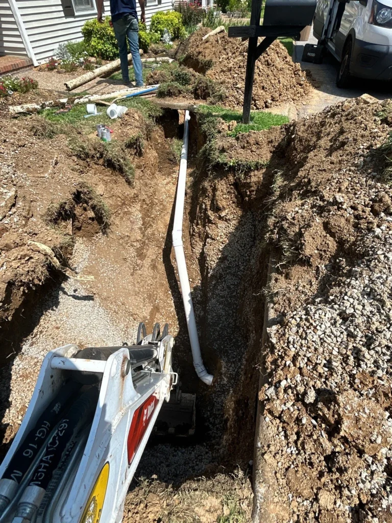 New sewer main laid in an open trench by 100 Percent Plumbing in Crieve Hall