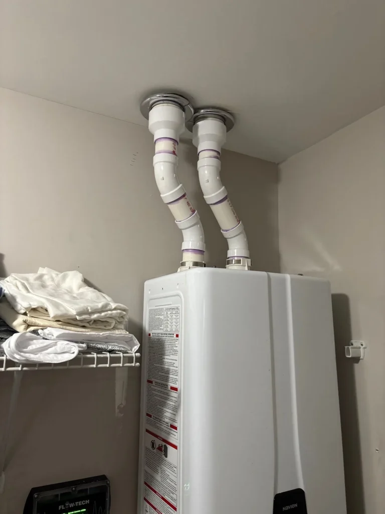 Navien tankless water heater installed with a FlowTech conditioner in West Nashville