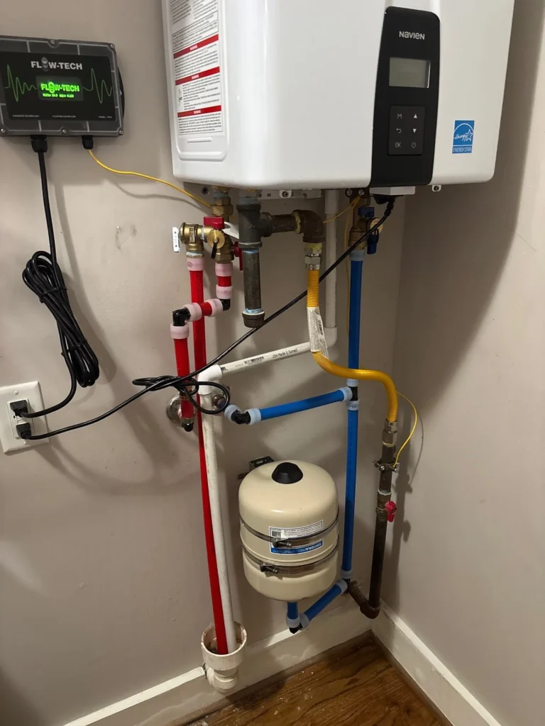 Navien tankless water heater and FlowTech conditioner installed in The Nations