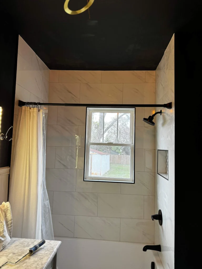 Finished tub and tile shower tiled to the ceiling in Nolensville