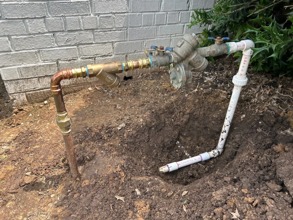 Commercial backflow assembly with test cocks and relief valve relocated outside a building in Donelson