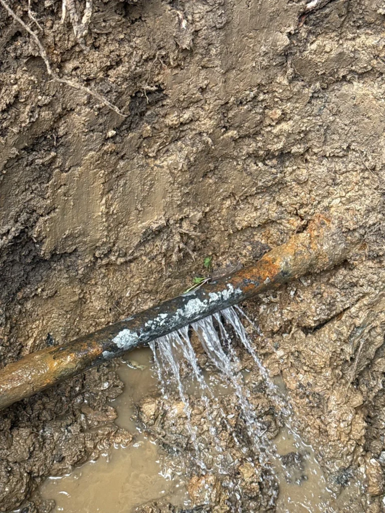Water spraying from the failed section of line found in Donelson