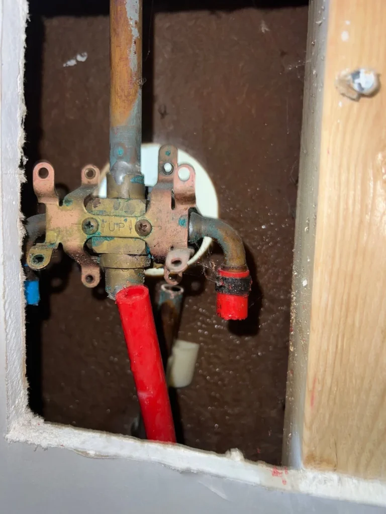 New shower valve roughed in behind an open wall in Murfreesboro