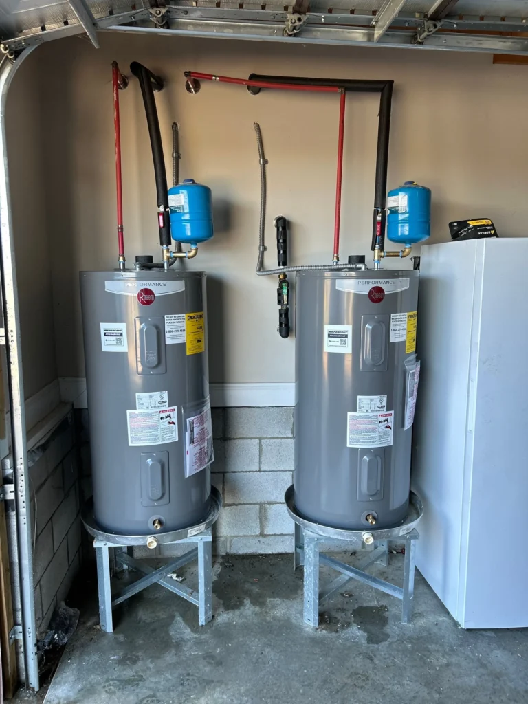 Two electric water heaters replaced by 100 Percent Plumbing in Lebanon