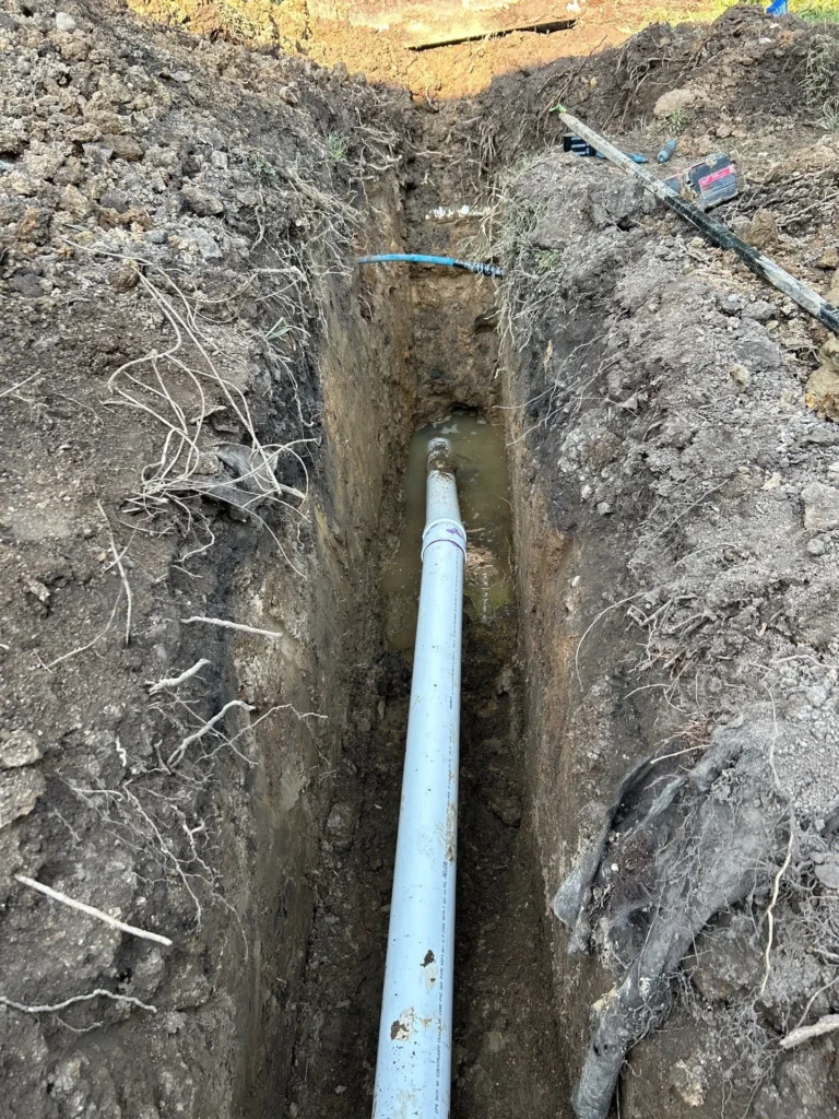 New sewer line laid the length of an open trench in Nashville