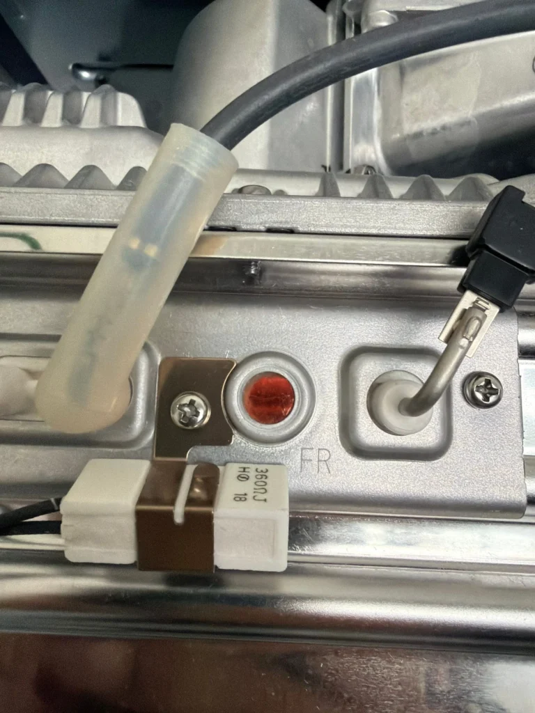 Tankless water heater controls checked during a repair near 12 South